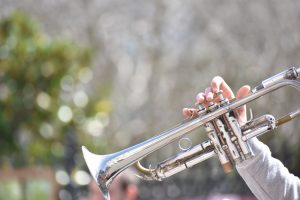 A person playing a trumpet